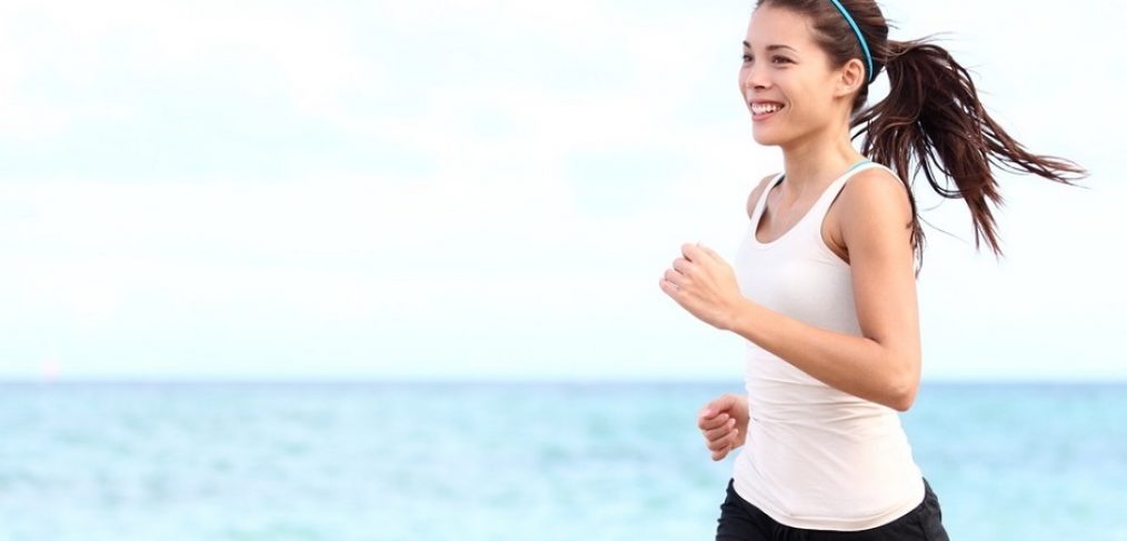 Woman running on the beach