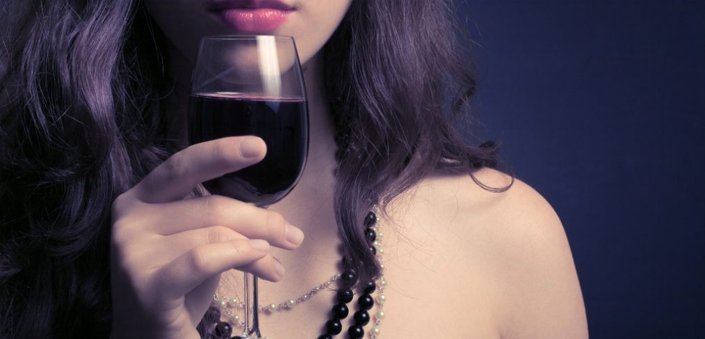 Woman drinking red wine