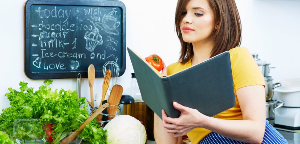 Woman trying to decide what to make for dinner.