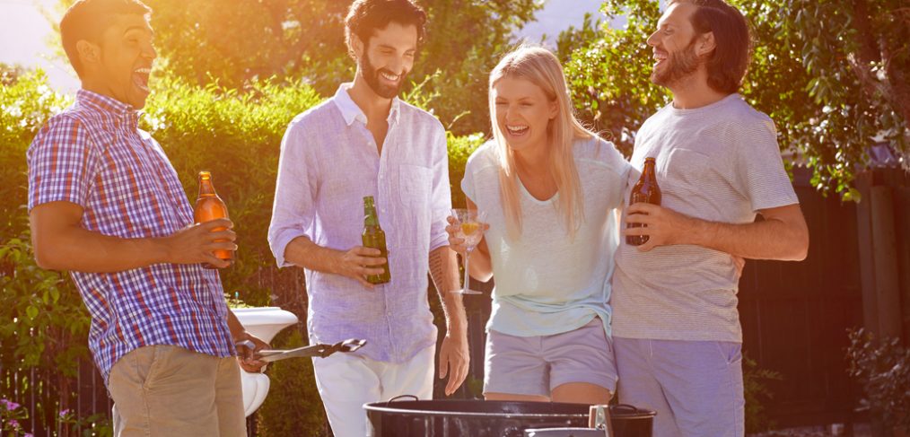 Friends having fun in a summer BBQ