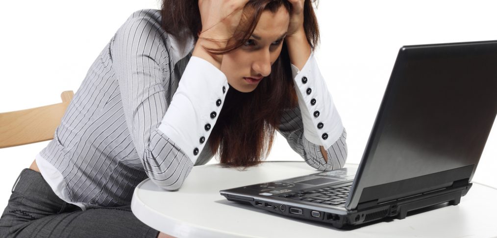 Stressed woman at work.