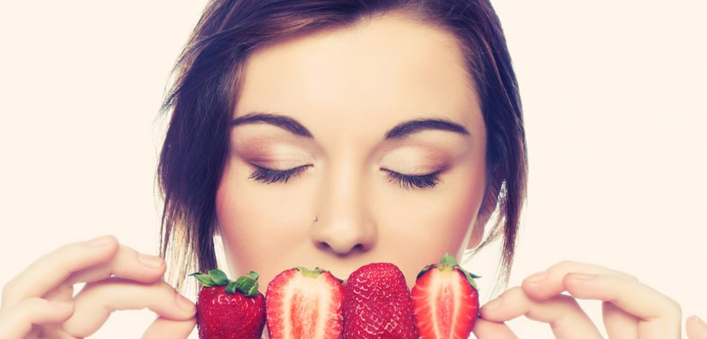 Woman eating berries