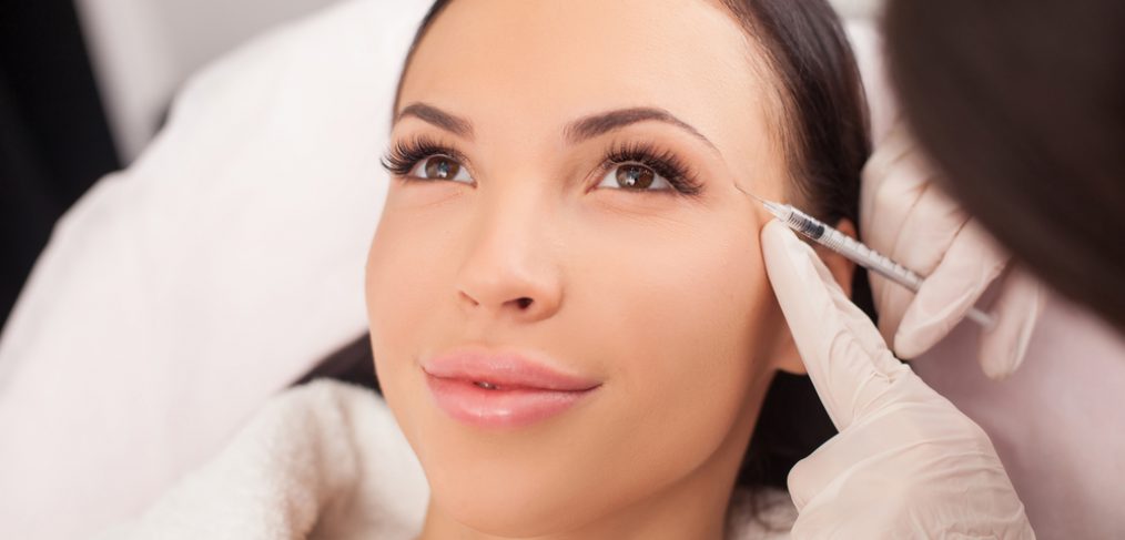 Woman receiving botox injection