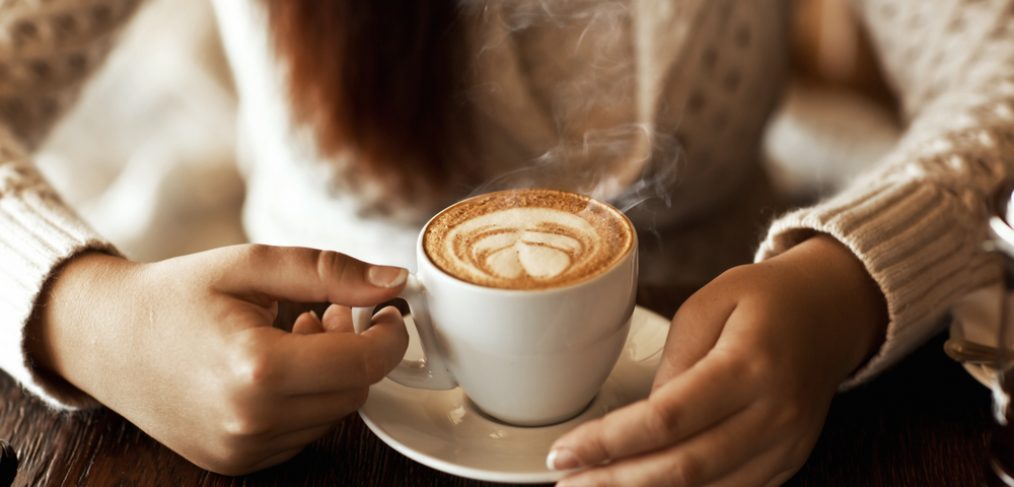 Woman having coffee