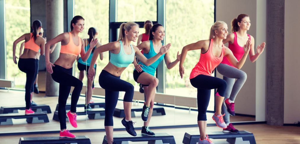 Group of people exercising in aerobics class