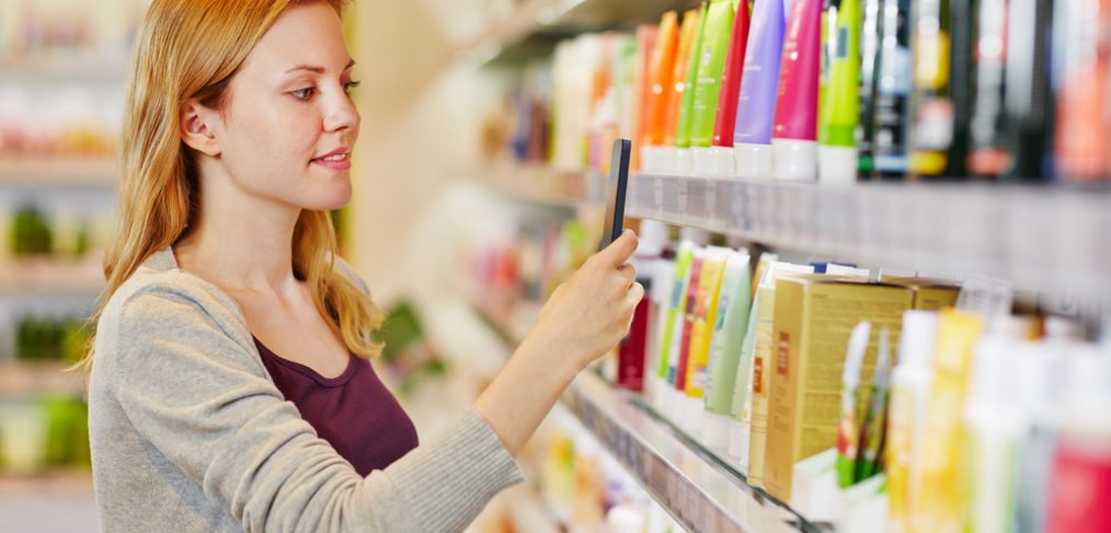 Woman buying cosmetics from a store