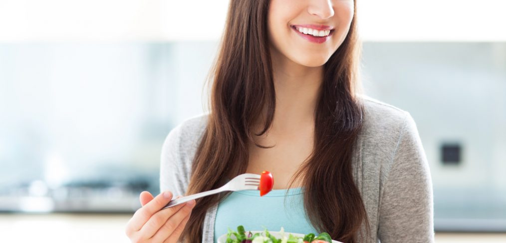 Woman eating healthy food