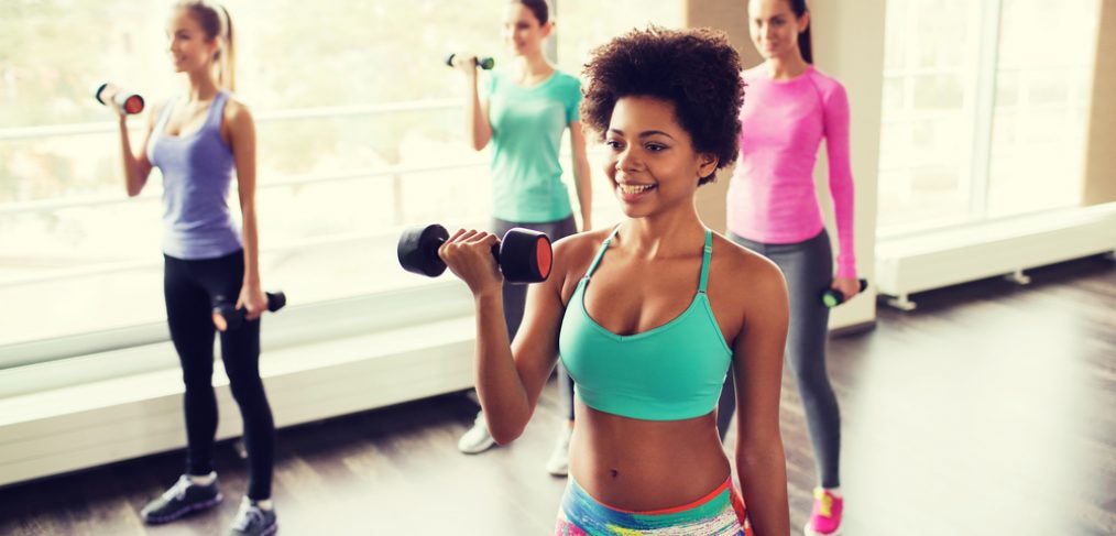 Group of people working out in gym