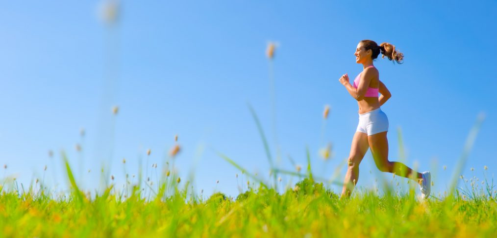 Healthy woman jogging outdoors
