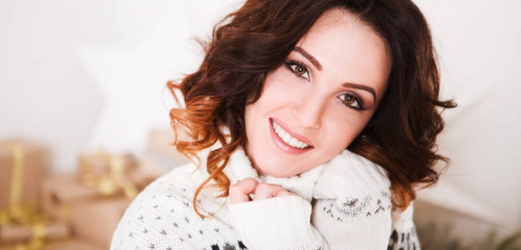 Smiling woman in winter sweater
