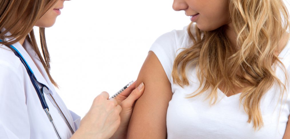 Woman receiving booster shot