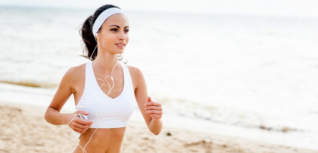 Women jogging on the beach