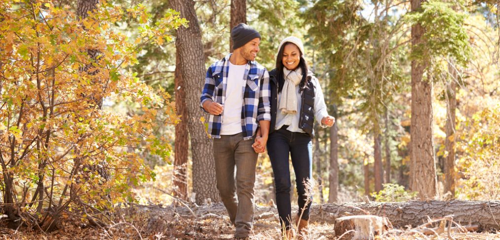 Couple walking in the woods